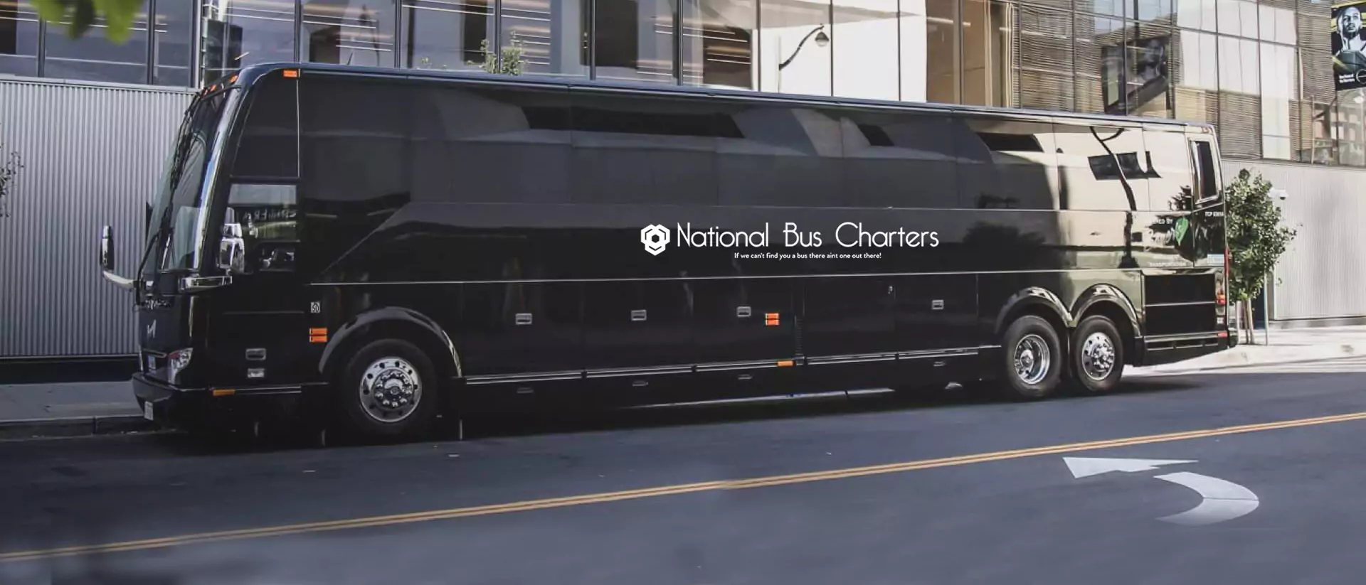 black luxury bus on road