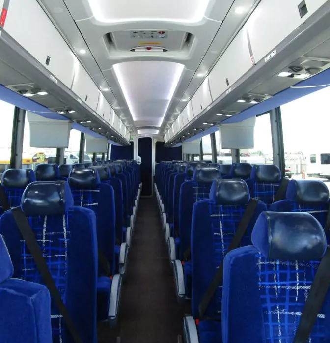 Luxury charter bus interior with comfortable seating